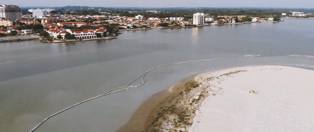 Fig.-1-Aerial-view-of-the-proximity-of-the-land-reclamation-area-to-the-settlement